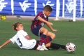 Un jugador del Levante UD y otro rival disputan el balón en el II Torneo Tornem! de Manises